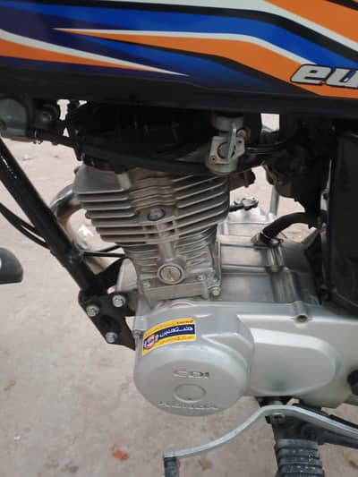 Honda cg125 2018 model  ha lek 710 namber ha gis Bhai ne Leni ho