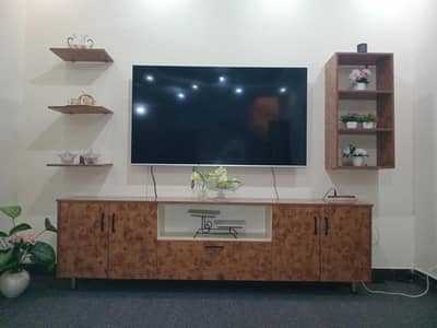 TV console for sale with cabinets and shelves