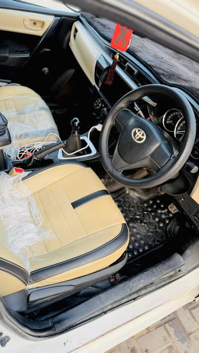 corolla white model 2015