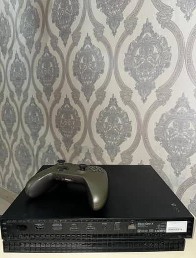 Xbox One X 1tb With 18 Games and Wireless controller