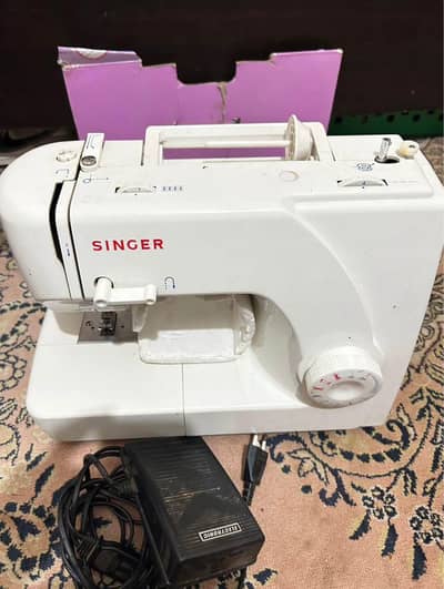 Singer machine