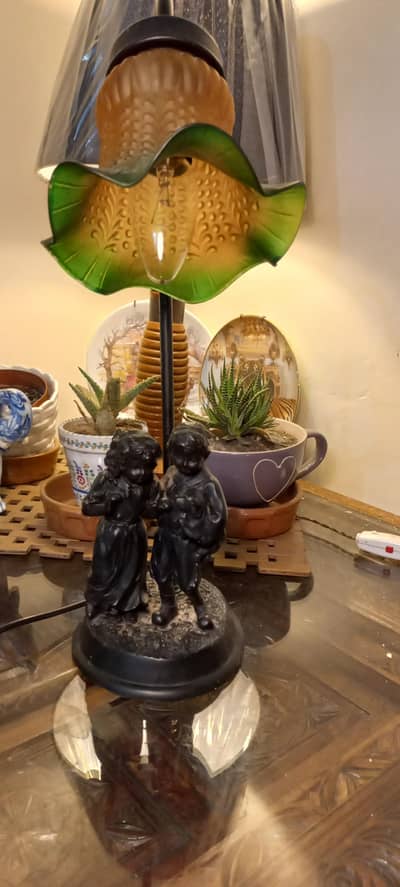 antique figuring  table lamp