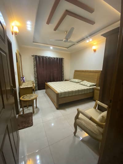 Wooden king size bed set/walnut color/used 5months/ like new. With m