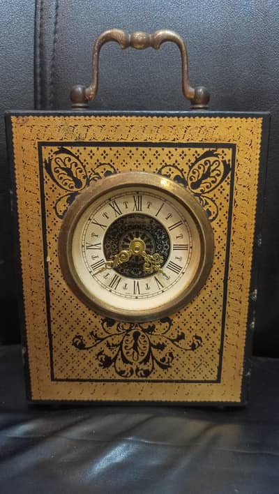 By appointment to the swedish Royal court, 24k gold embossing clock