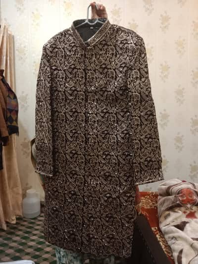 Groom, sherwani dhal dress