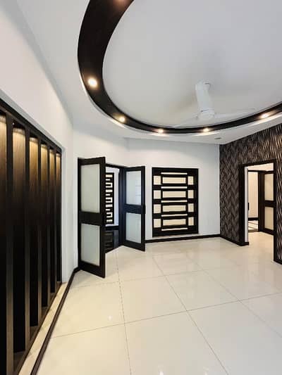 1 Kanal well Maintained owner built Full House available for rent at ideal Location in DHA Phase 2 near Ring Road and Allama Iqbal International Airport Lahore