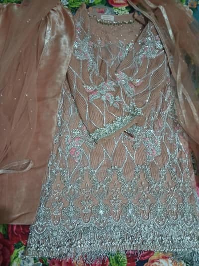 Elegant peach heavy embroidered fancy suit by Aminah badar