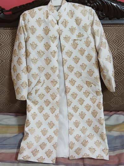 beautiful embroided white and golden coat