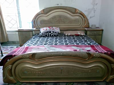 double bed with side table and dressing table and long mirror