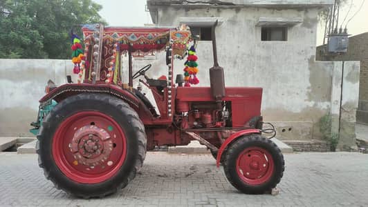 Package Deal: 2007 Tractor with Thresher, Blade, and Trailer"