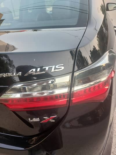 Toyota Corolla Altis X Grande 2024 Black Interior  Attitude Black