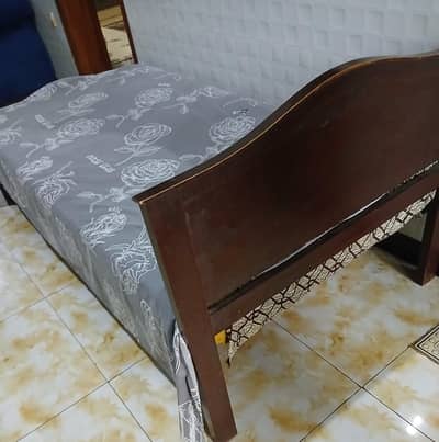 one double bed with 2 sidetables and one single bed