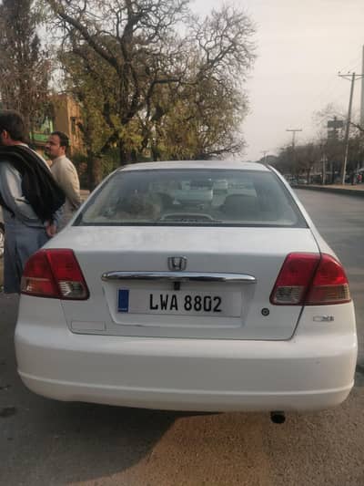 2005 honda civic exi total genuine