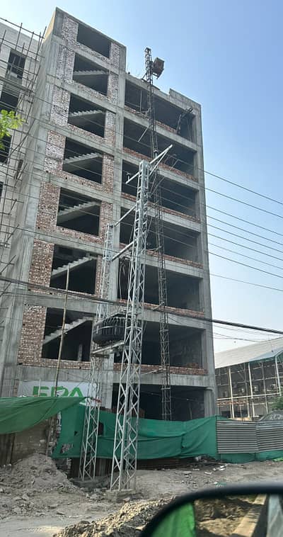 1 KANAL 7 STORY COMMERCIAL BUILDING, 2 LIFTS, M/F WASHROOMS NEAR CANAL FOR RENT