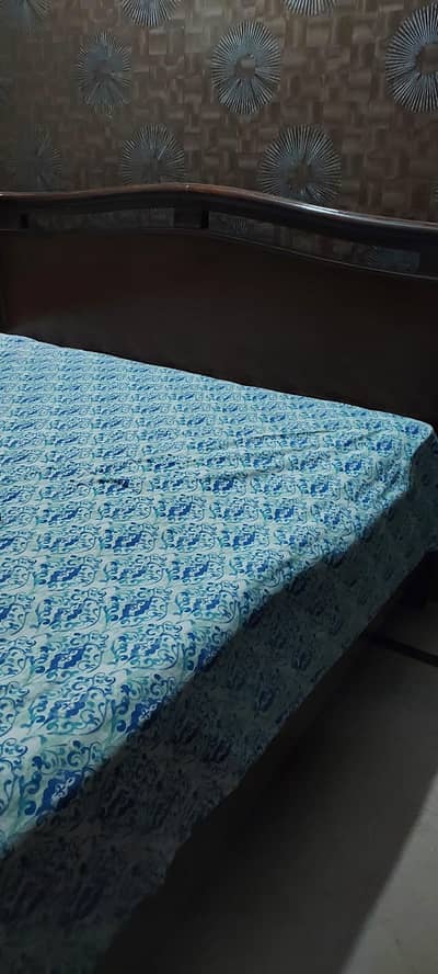double bed with spring mattress