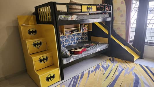 Bunk Bed with Slide and Rug