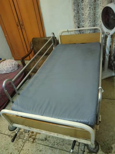 patient bed with mattress, machine