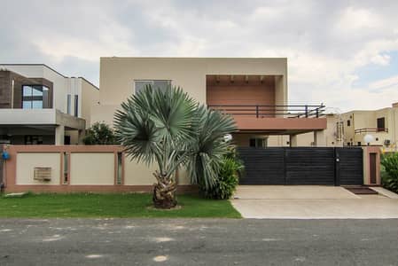 Ultra-Stylish 1-Kanal Slightly Used Masterpiece Ultra Modern Bungalow For Sale At Prime Location Of , DHA PHASE 4 Lahore