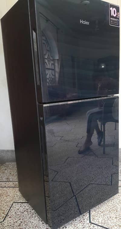 Haier HRF-216 refrigerator in black colour