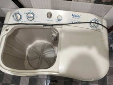 Haier Washing machine plur drayer.