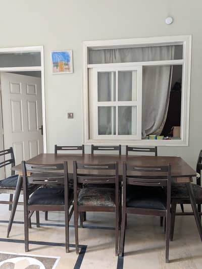 8 seater wooden dining table