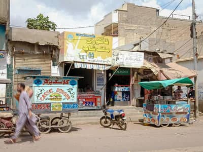 ". Plot & 4 Shops For Sale. << 