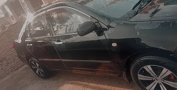 Toyota Corrola Gli 2007 modle islamabad number black colour