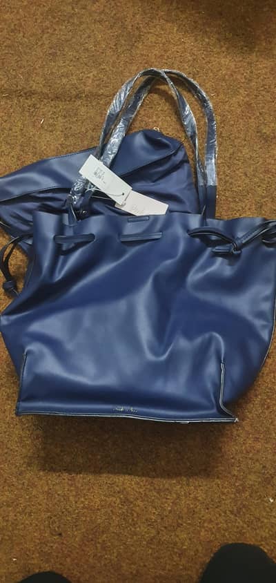 Peek a boo Brand (Import) New Ladies Leather Hand Bag 2 piece.