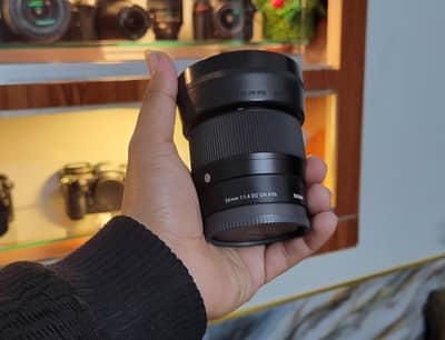 Sigma 56mm f1.4 (10/10)