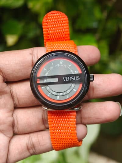 Versus Watch Orange Straps  Movement: Swiss Quartz Chronograph