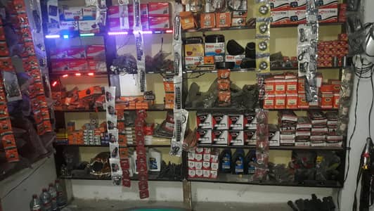 Running Motorbike shop business for sale on urgent basis