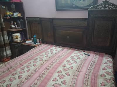 king size bed with side table and side table rack