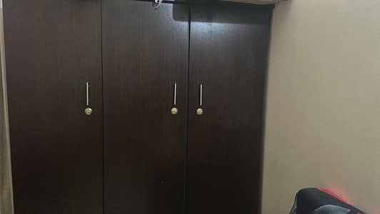 triple door cupboard