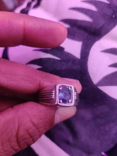 sliver ring with blue Sapphire stone