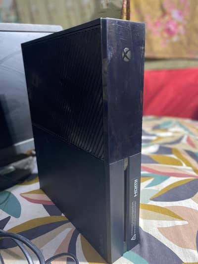 Xbox one with two controllers and monitor