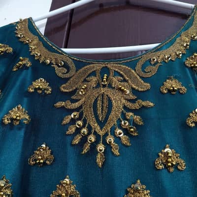 one time used long mexi with inner and attached can can