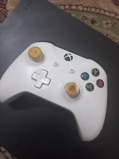 xbox one x with box and original controller
