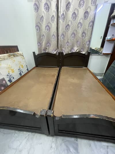 2 single beds without matrix