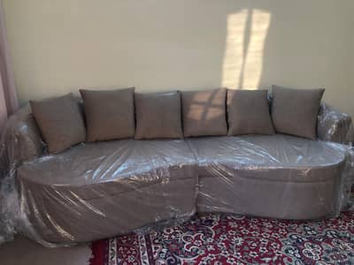 Brand New Curved Sofa – Elegant Design, Unused
