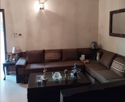 A Back of Main House Of 10 Marla In Faisal Town