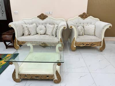 Sofa set with glass top table