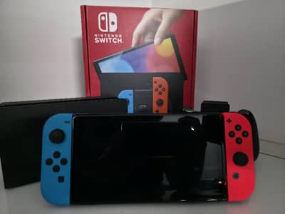 Nintendo Switch Oled Open Box. never used. WITH VARIOUS ACCESSORIES