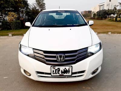 Lady Doctor used Antique Honda City 2014 M/T, B 2 B Genuine Loc LHR