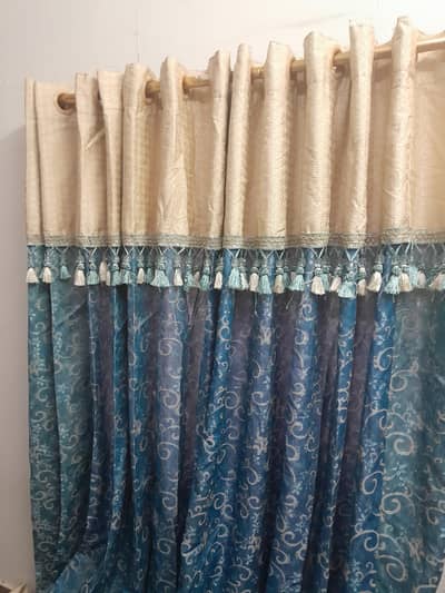 4 panels of two windows  curtains