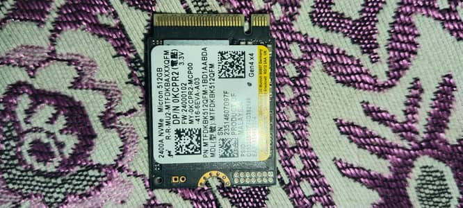 Original Micron 2400A NVMe solid-state drive with 512GB capacity.