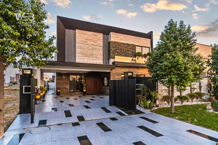 Modern Desiigned With Imported Wooden interior This 1 Kanal House in Phase 7 FOR Sale