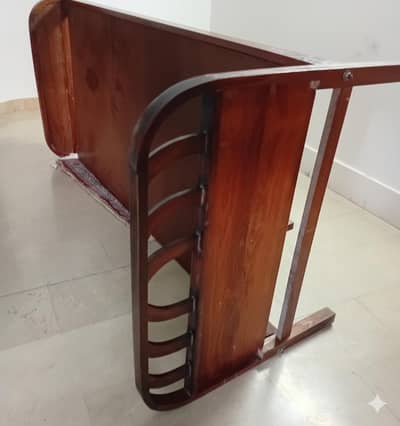 single solid bed with two side tables