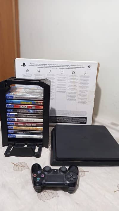 PS4 Slim 1TB + Controller + 9 games + Stand