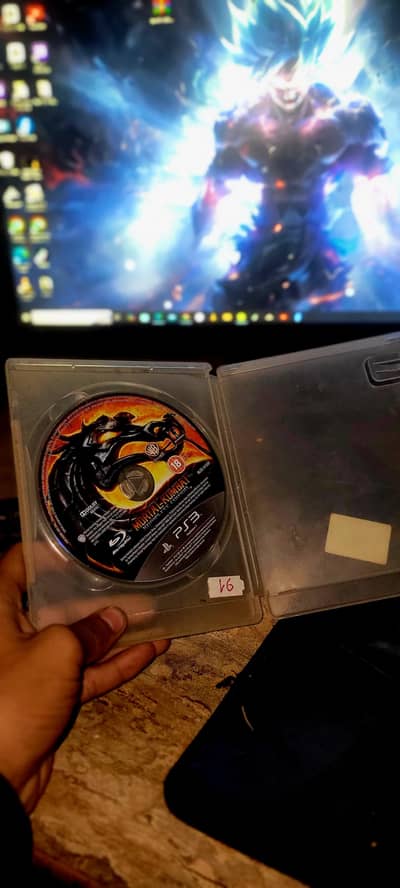 play station 3 with  2 joysticks and 12 games