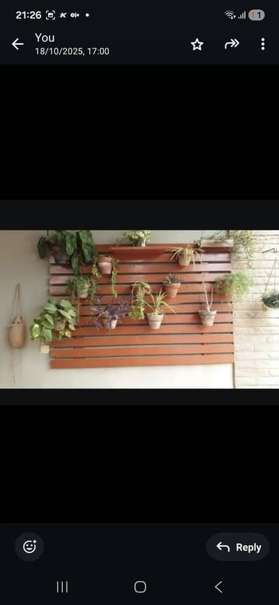wooden planter stand with iron holders